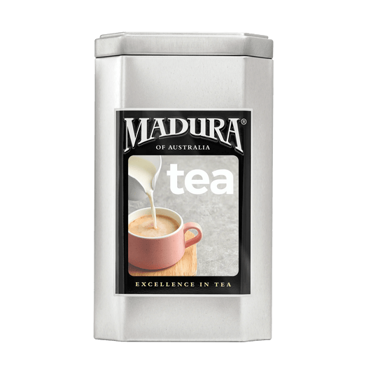 Empty Caddy with Pouring Milk in Pink Tea Cup Label - Madura Tea